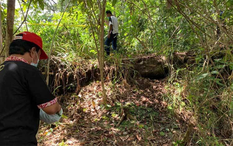 Ritual Mapas Lewu di lokasi tempat penemuan mayat di wisata alam Bukit Banama Tangkiling