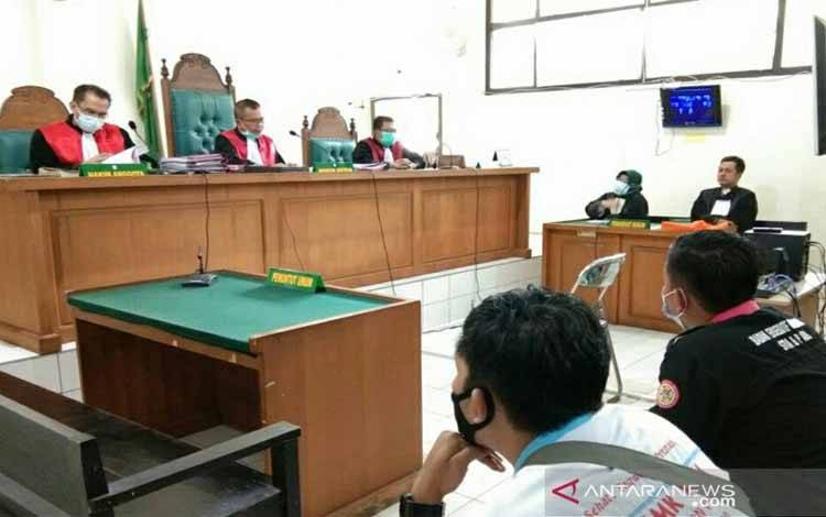 Sidang virtual di PN Palembang dengan agenda vonis lima terdakwa pelaku pengrusakan mobil milik Polda Sumatera Selatan, saat unjuk rasa penolakan Omnibus Law 8 Oktober 2020, Kamis (28/1/2021)