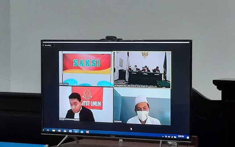 Dofirul Hasan, terdakwa kasus penipuan bermodus penggandaan uang saat menjalani sidang tuntutan, Senin, 1 Februari 2021.