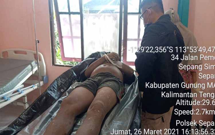 Mayat Suyanto saat di puskesmas di wilayah Kecamatan Sepang, Kabupaten Gunung Mas