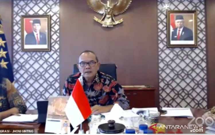 Direktur Jenderal Imigrasi Jhoni Ginting dalam acara temu media yang digelar secara daring, di Jakarta, Jumat (23/4/2021)
