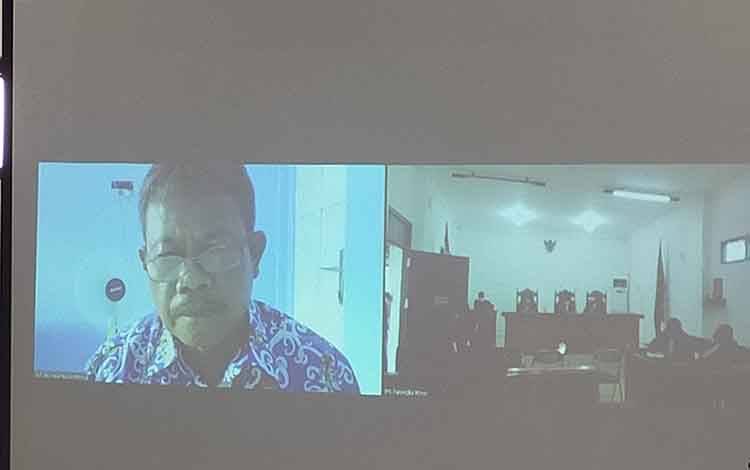 Terdakwa Widodo saat menjalani Sidang Putusan secara Virtual di PN Palangka Raya, Jumat, 9 Juli 2021