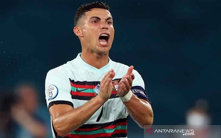 Kapten tim nasional Portugal Cristiano Ronaldo saat tampil dalam 16 besar Euro 2020 melawan Belgia di Stadion La Cartuja, Sevilla, Spanyol, Sabtu (27/6/2021)