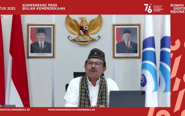 Menteri Komunikasi dan Informatika (Menkominfo) RI Johnny G Plate dalam jumpa pers peluncuran Rumah Digital Indonesia, yang dihelat secara daring pada Jumat (30/7/2021). (ANTARA/TL/Arnidhya Nur Zhafira)