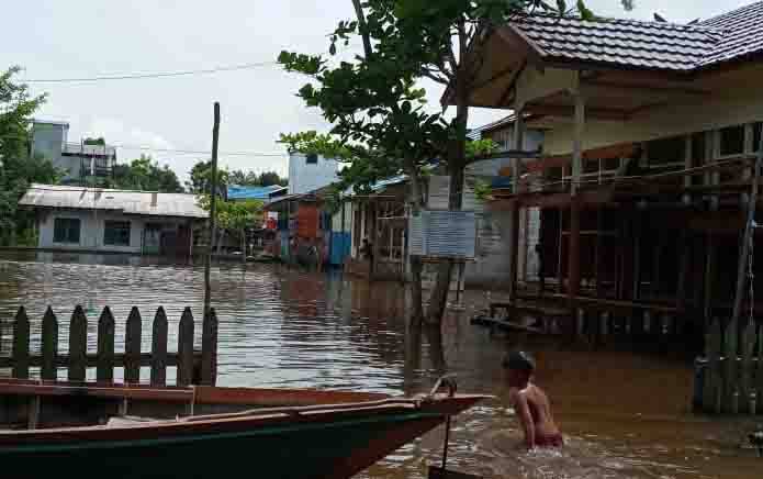Kondisi banjir di Desa Tarusan, Kecamatan Dusun Utara