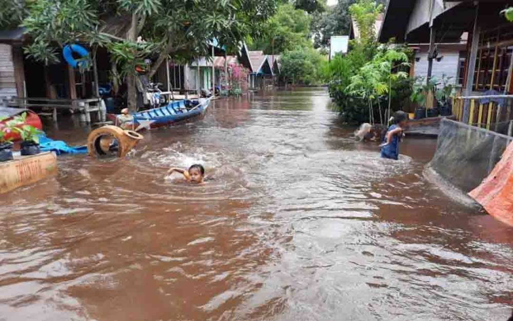 CAPTION: Bencana banjir yang terjadi di Kalteng.