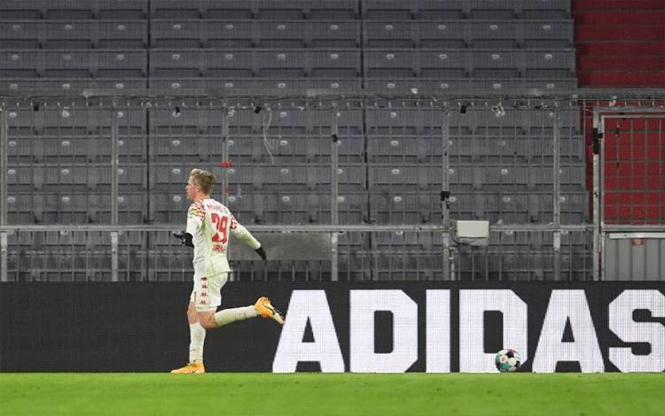 Foto arsip - Pemain Mainz Jonathan Burkardt saat merayakan gol ke gawang Bayern Muenchen dalam pertandingan liga di Muenchen pada 3 Januari 2021. (AFP/ANDREAS GEBERT)