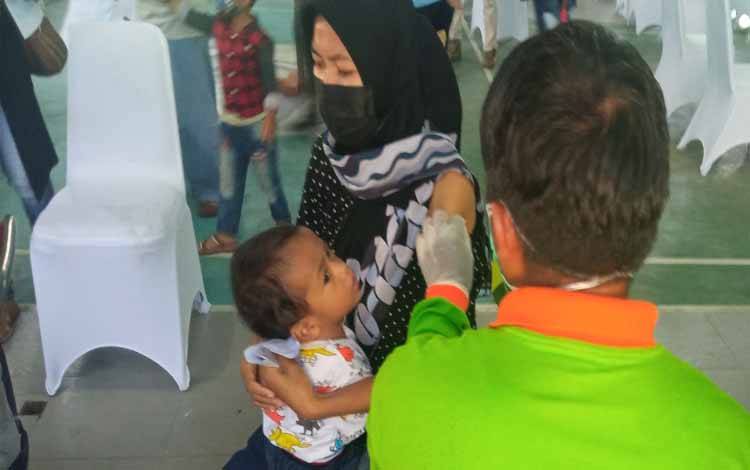 Vaksinasi massal yang digelar di Desa Sulung, Kecamatan Arut Selatan, Kabupaten Kobar, Sabtu 30 September 2021
