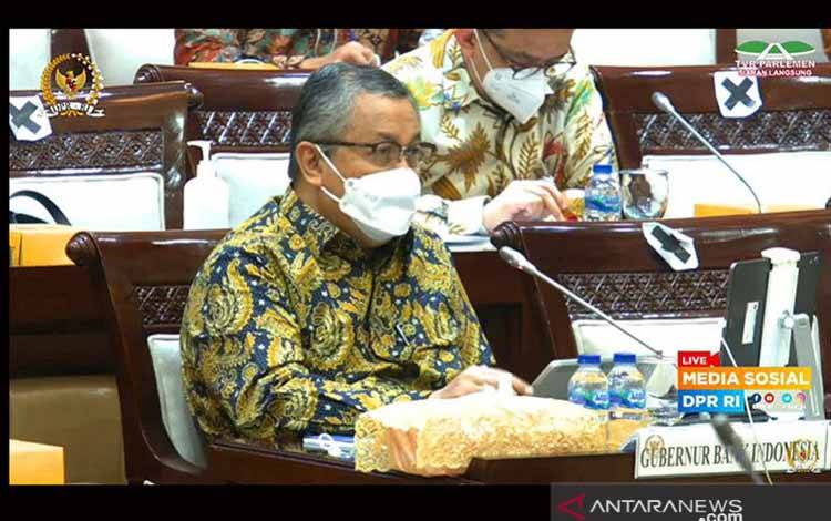 Gubernur Bank Indonesia Perry Warjiyo saat Raker bersama Komisi XI DPR RI di Jakarta, Senin (14/6/2021)
