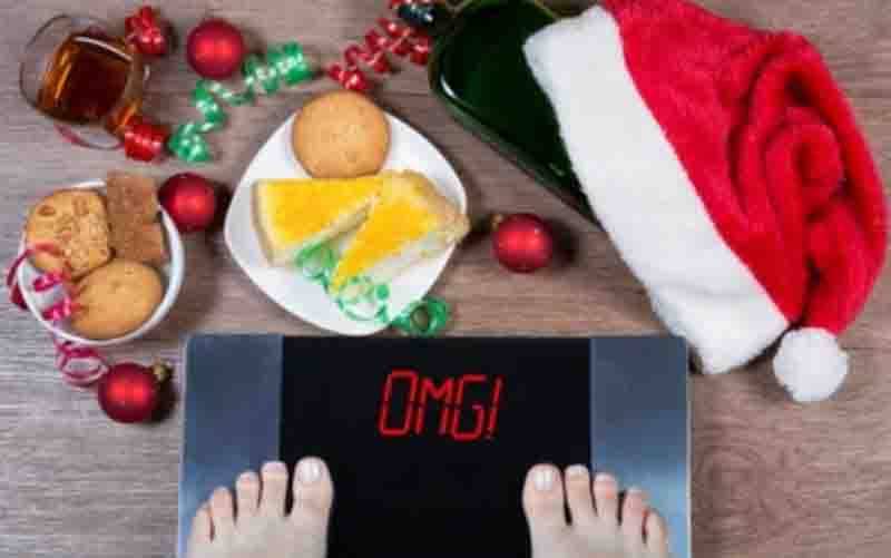 Ilustrasi berat badan meningkat selama perayaan Natal. (foto : ANTARA/Shutterstock)