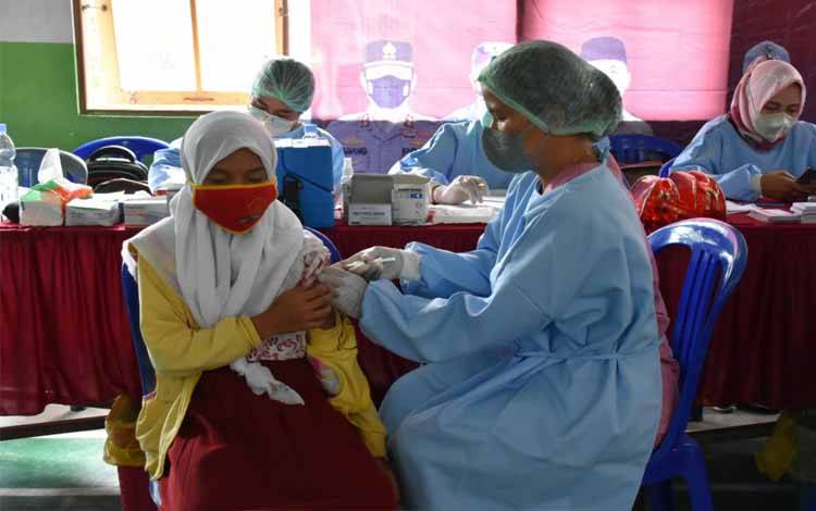 Pelaksanaan vaksinasi covid-19 di Kabupaten Kapuas.