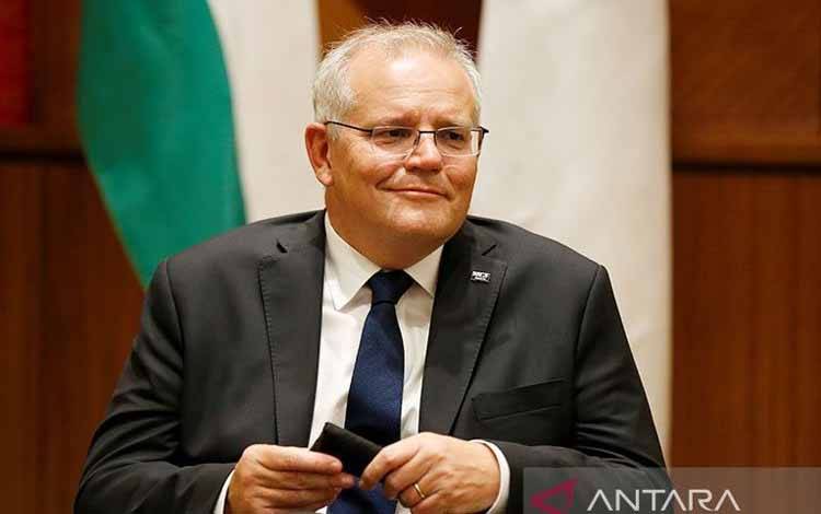  Perdana Menteri Australia Scott Morrison berbicara kepada media di Kantor Parlemen Persemakmuran Melbourne, di Melbourne, Australia 11 Februari 2022