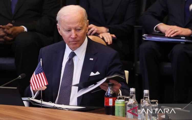 Presiden AS Joe Biden menghadiri pertemuan Dewan Atlantik Utara selama pertemuan puncak NATO untuk membahas invasi Rusia ke Ukraina, di markas NATO di Brussels, Belgia, 24 Maret 2022