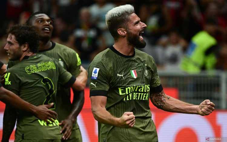 Penyerang AC Milan Olivier Giroud melakukan selebrasi seusai mencetak gol ke gawang Bologna dalam pertandingan Serie A Italia pada 28 Agustus 2022. ANTARA/AFP/MIGUEL MEDINA