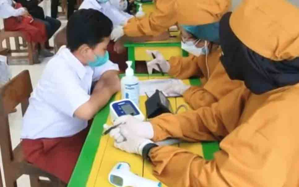 Vaksinasi untuk pelajar sekolah dasar. Pemerintah kedepan merencanakan untuk vaksinasi anak usia dibawah 6 tahun. (FOTO: ISTIMEWA)