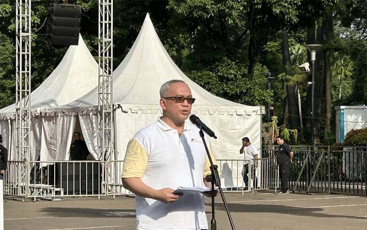 Ketua KPPIP Wahyu Utomo saat membuka acara Sewindu PSN di kawasan Gelora Bung Karno Senayan Jakarta, Minggu (14/5/2023). ANTARA/Kuntum Riswan.