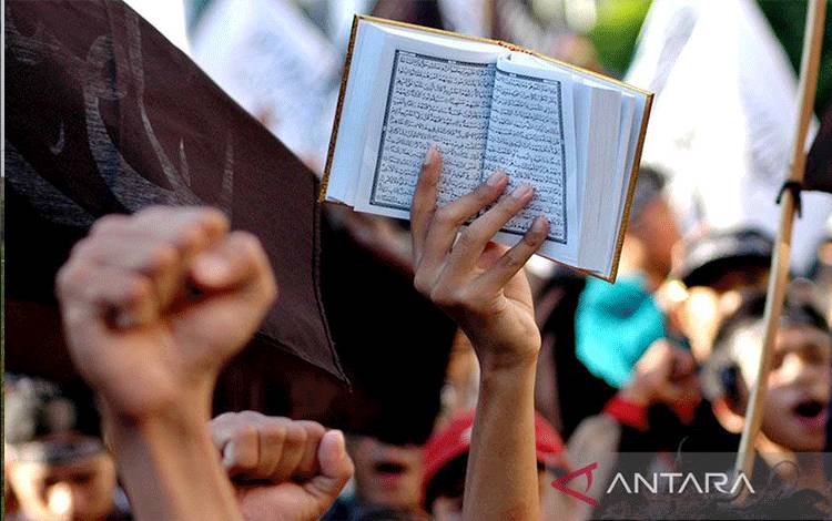 Ilustrasi - Sejumlah pengunjuk rasa mengecam pembakaran Al Quran. ANTARA/Noveradika/ss/pd/pri