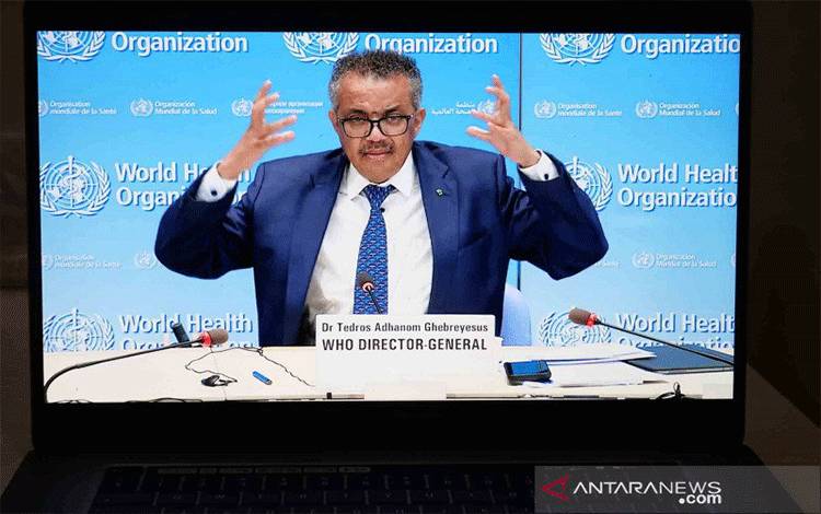 Arsip - Layar monitor menampilkan Direktur Jenderal Organisasi Kesehatan Dunia (WHO) Tedros Adhanom Ghebreyesus saat berbicara dalam konferensi pers daring dari Jenewa, Swiss, di Brussel, Belgia, 29 Juni 2020. (ANTARA FOTO/Xinhua/Zhang Cheng/wsj)