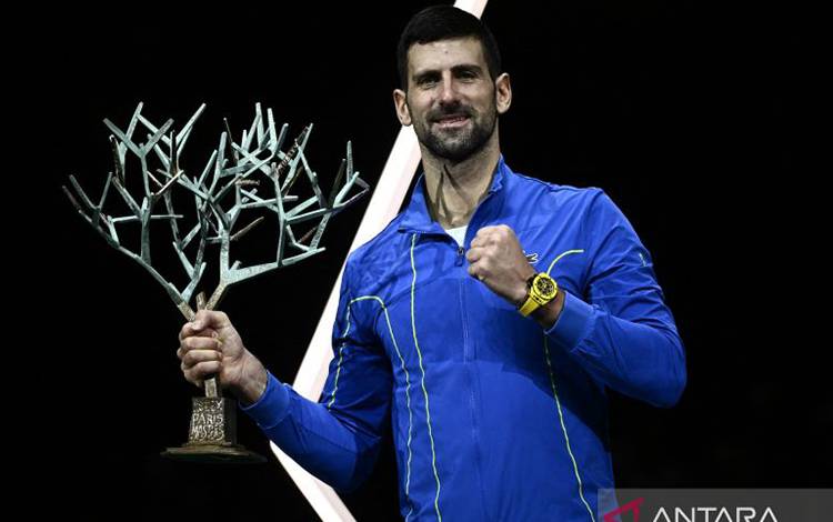 Petenis Serbia Novak Djokovic. JULIEN DE ROSA / AFP