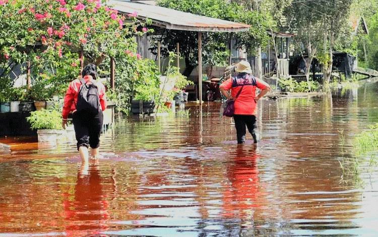 Banjir yang terjadi di salah satu wilayah Kota Palangka Raya akibat intensitas hujan tinggi pada tahun lalu. (FOTO: BPBD KOTA PALANGKA RAYA)