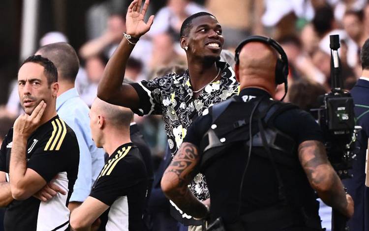 Gelandang Juventus Paul Pogba. (Photo by Marco BERTORELLO / AFP) (AFP/MARCO BERTORELLO)