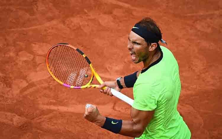 Petenis Spanyol Rafael Nadal. (AFP/CHRISTOPHE ARCHAMBAULT)
