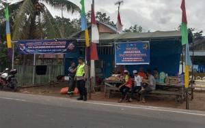 Personel Polsek Kapuas Timur Patroli ke Rest Area Pelayanan Jemaah Haul Abah Guru Sekumpul